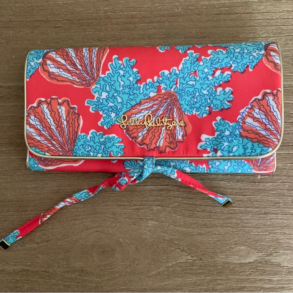 Lilly Pulitzer NWOT travel jewelry pouch, orange Aqua shells and coral print.